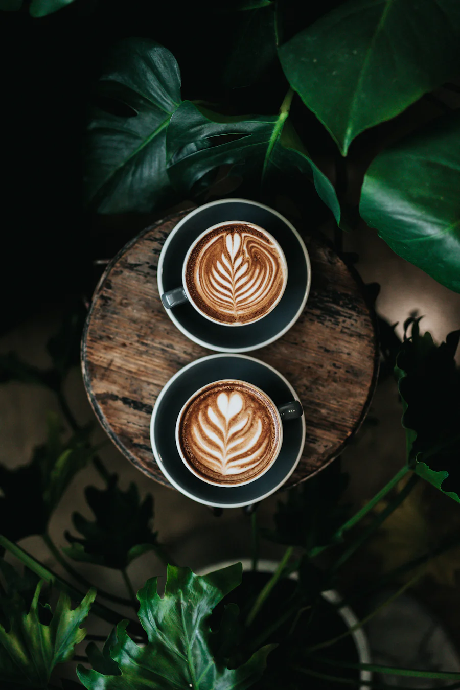 Two cups of coffee on a café table